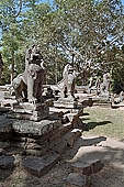 Banteay Kdei temple - cruciform terrace with naga-balustrades and lions before east gopura III.